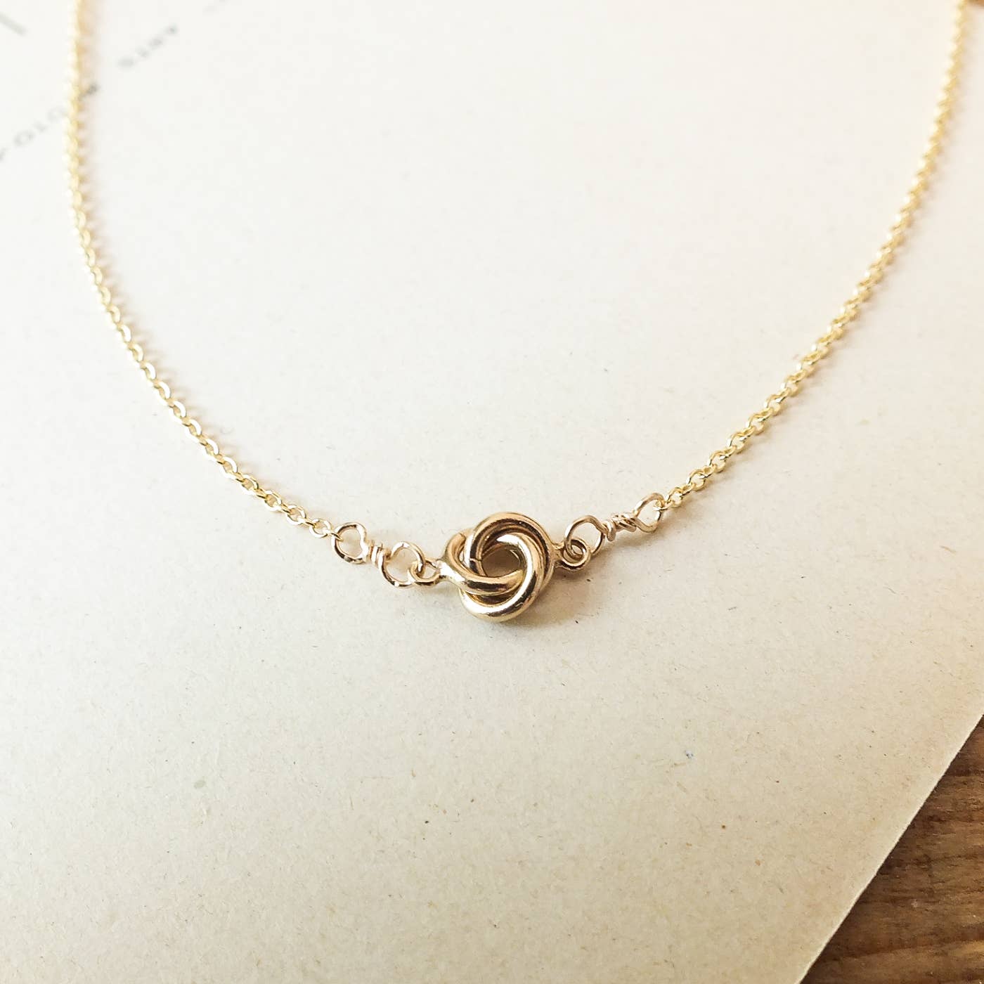 BECOMING JEWELRY Love Knot Necklace: Gold Fill